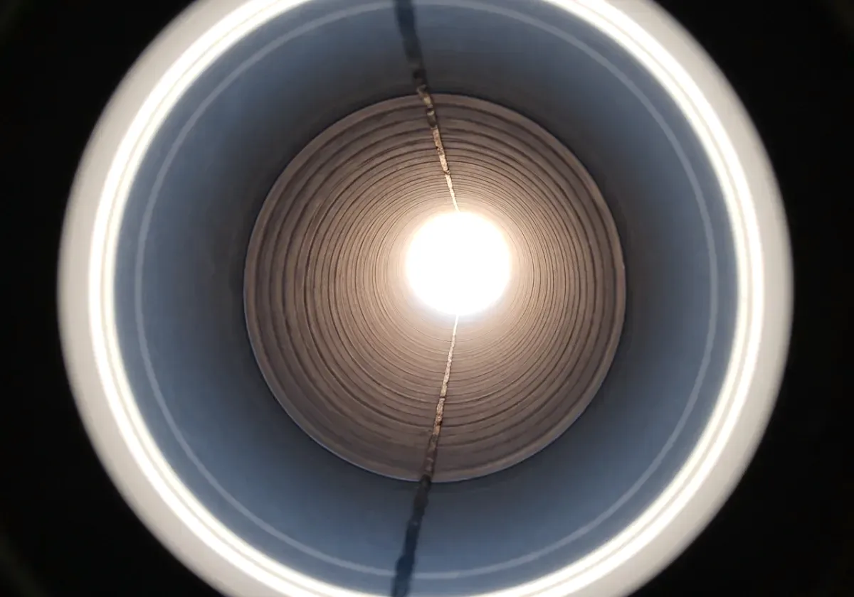 After — chimney inspection: A camera run up the flue exposes damage no look from the hearth could catch.