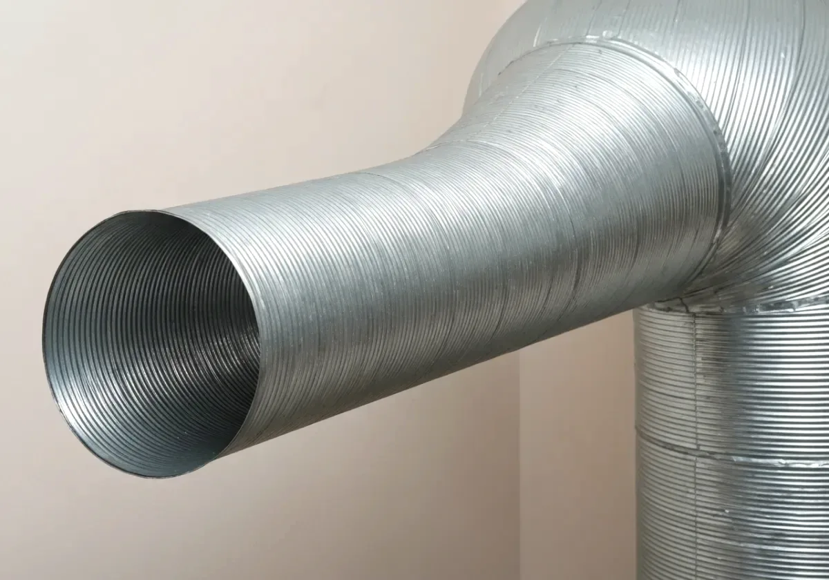 After — dryer vent cleaning: A lint-choked dryer run opened up for faster, cooler, safer drying.